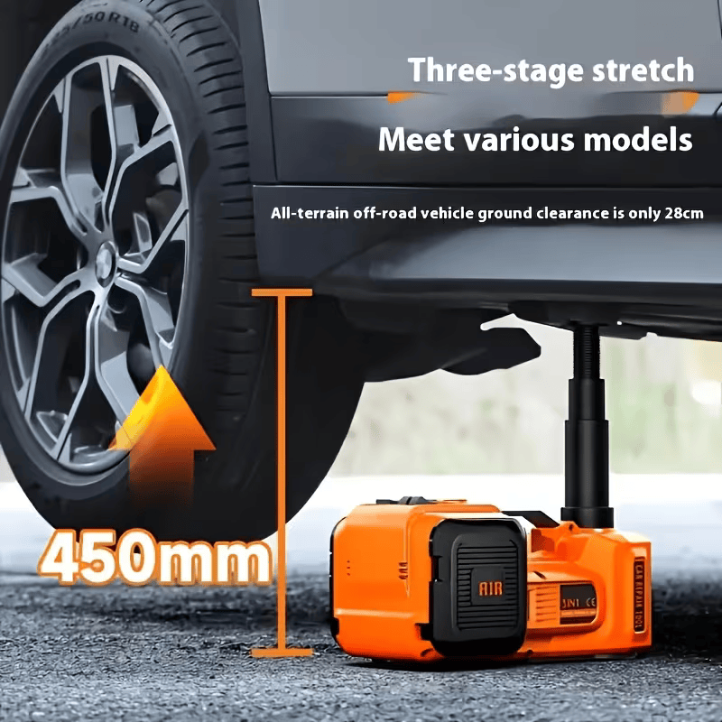 Electric hydraulic jack lifting a car by the side of the road